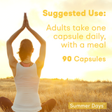 Suggested use for Summer Days: Adults take one capsule daily with a meal. Image shows a person meditating outdoors at sunrise.